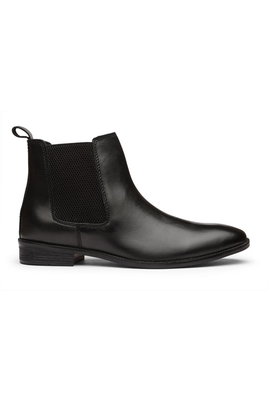 Black Chelsea boot with elastic side on a white background