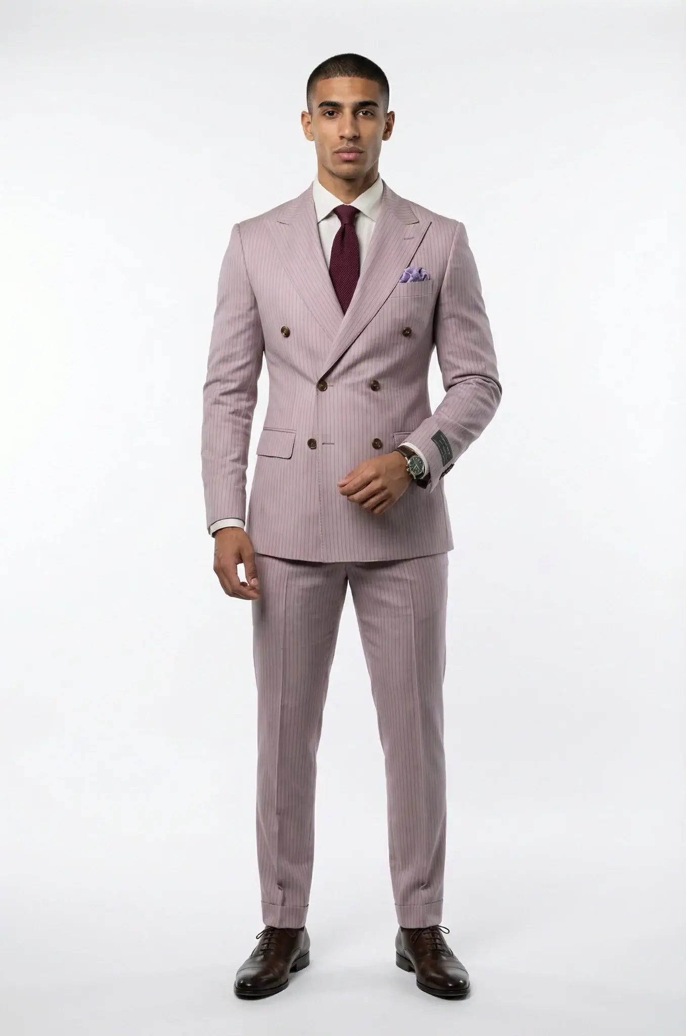 2-Piece Double Breasted Peach Pinstripe Suit – a refined peach-toned ensemble featuring a custom tailored double-breasted blazer with subtle pinstripes and matching trousers, crafted for a sharp, contemporary silhouette and elevated formal style.