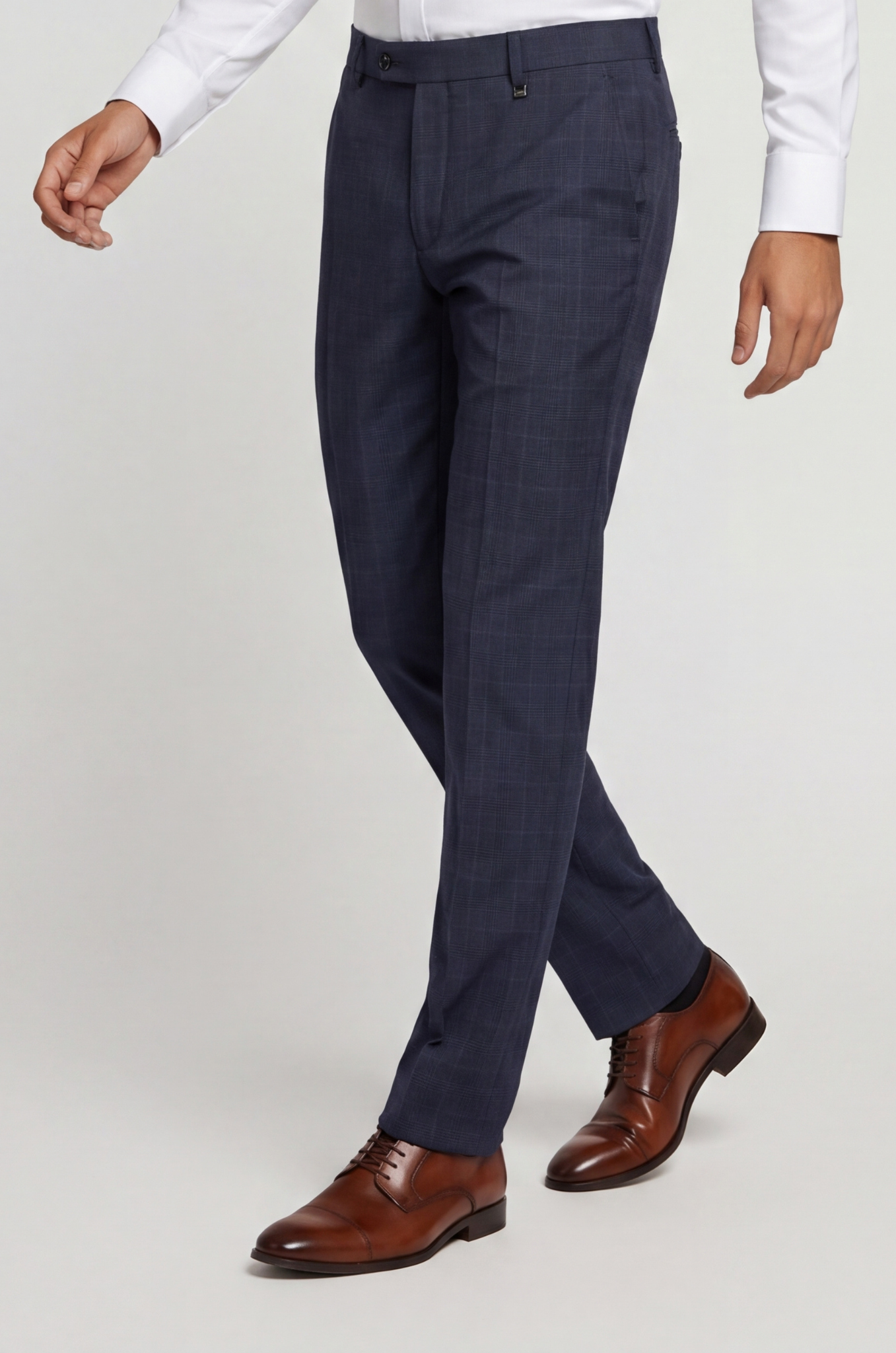Blutailor checkered blue Gurkha pants in premium fabric with a bespoke tailored fit, featuring a refined check pattern, high-waist design, and adjustable side tabs for a structured, elegant look.