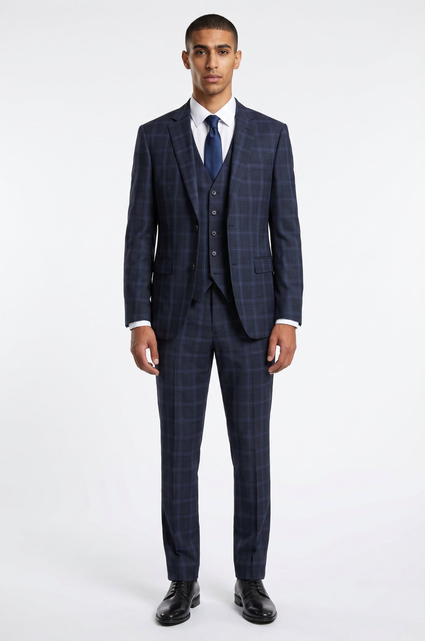 Blutailor Graphite Indigo Checkered 3 piece suit in premium fabric with a custom tailored fit, featuring a tailored blazer, matching waistcoat, and trousers with a refined checkered pattern for a sophisticated formal look.