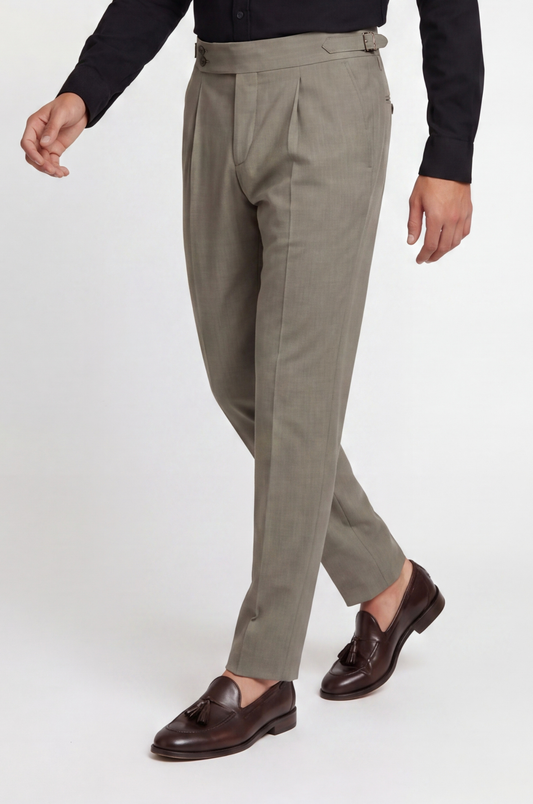 Blutailor gunmetal grey Gurkha pant in premium fabric with a custom tailored fit, featuring a sleek modern tone, high-waist design, and adjustable side tabs for a structured, refined look.