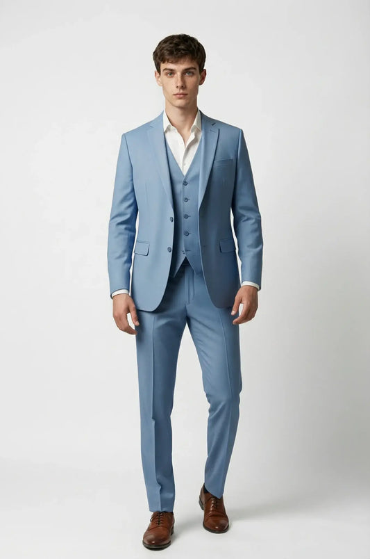 Blutailor Ice Blue 3-Piece Suit – a refined ice blue ensemble featuring a custom tailored blazer, waistcoat, and matching trousers, crafted for a sharp, modern silhouette and timeless formal elegance.