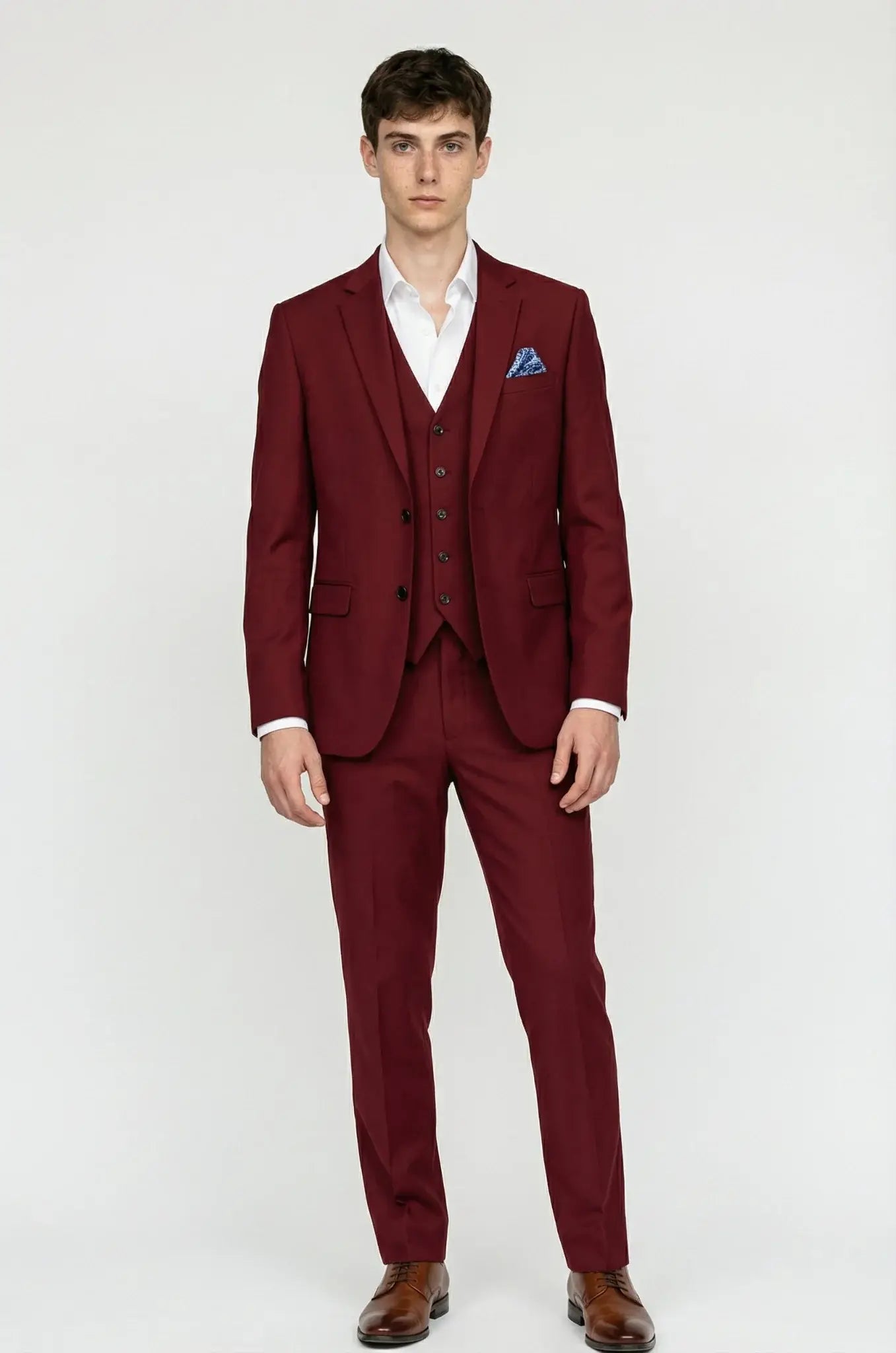 Maroon Essential 3-Piece Suit – a sophisticated maroon ensemble featuring a bespoke-crafted blazer, waistcoat, and tailored trousers, designed for a refined silhouette and elevated formal elegance.