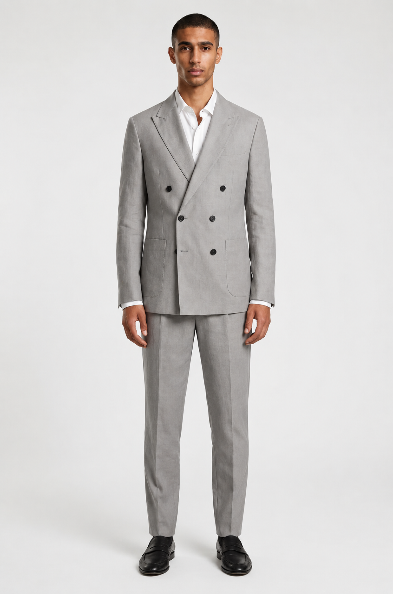 Blutailor Pearl Slate linen double-breasted suit in premium breathable linen fabric with a custom tailored fit, featuring a structured blazer and matching trousers for a refined and sophisticated summer look.