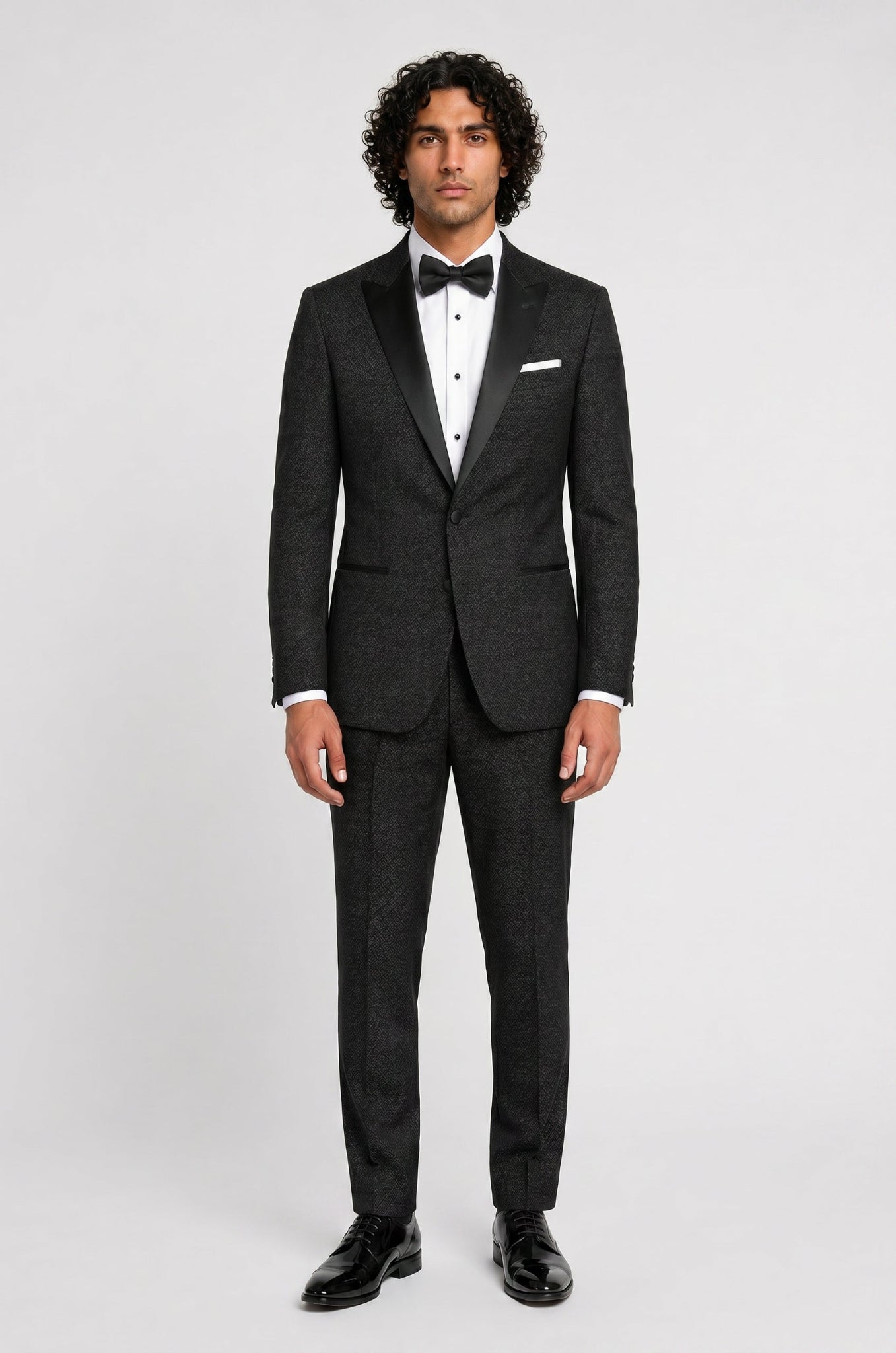 Blutailor self textured peak lapel 3 piece tuxedo in premium fabric with a custom tailored fit, featuring a sleek blazer, waistcoat, and trousers for a refined and sophisticated formal look.
