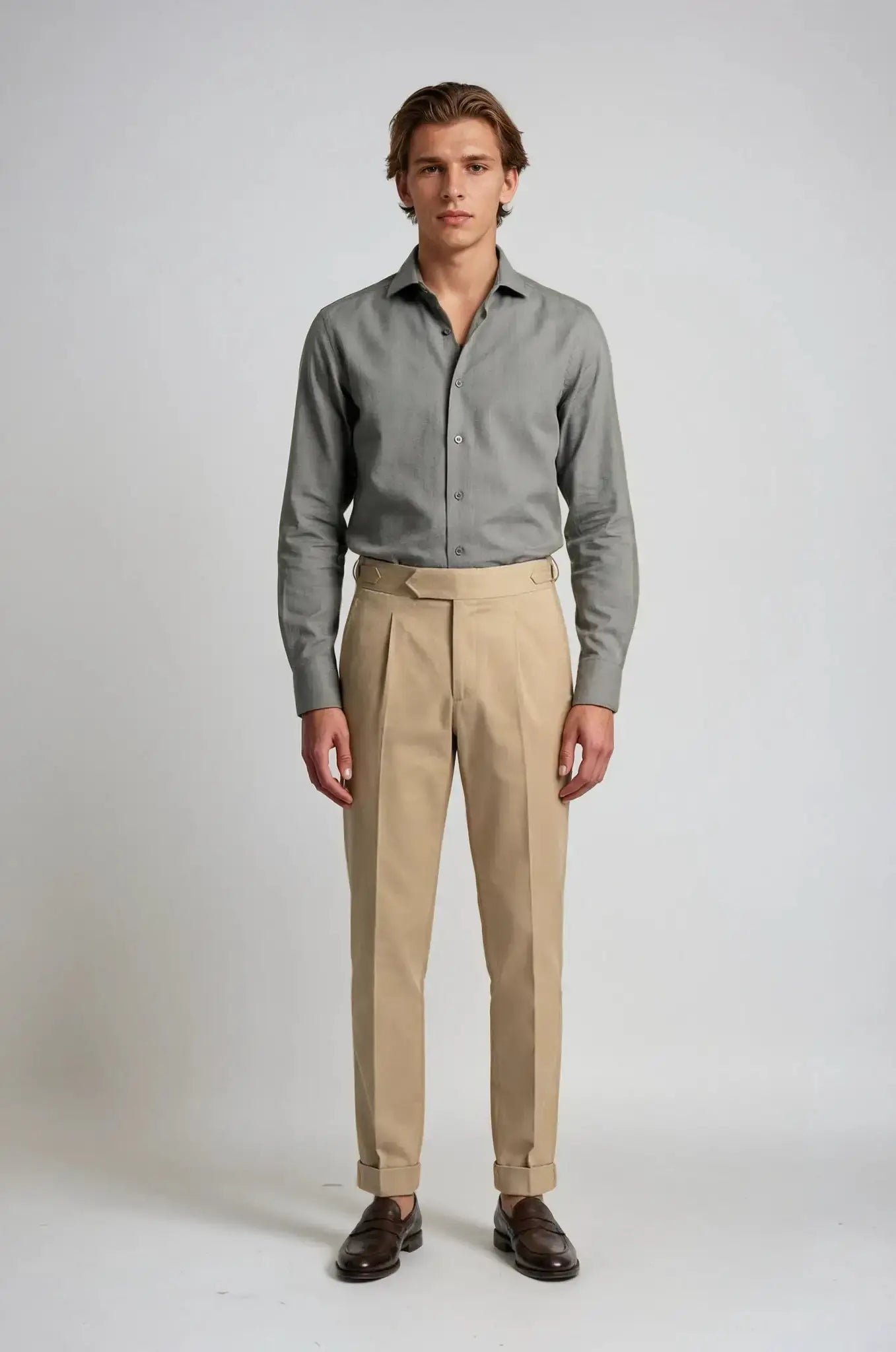 Blutailor Summer Sand Gurkha Pants – a refined sand-toned trouser featuring a custom high-waisted Gurkha design with adjustable side tabs, tailored for a sharp, structured fit and effortless summer elegance.
