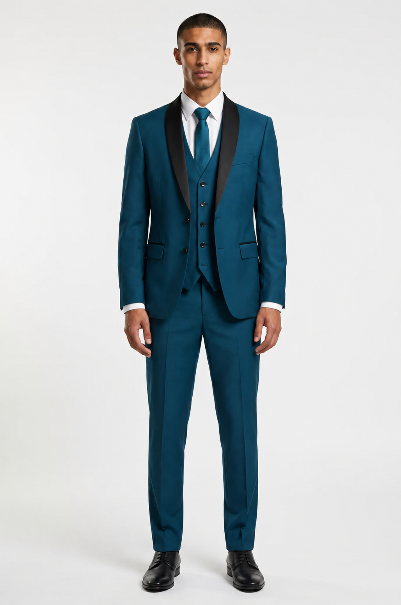 Blutailor teal blue shawl lapel 3 piece tuxedo in premium fabric with a custom tailored fit, featuring a sleek blazer, waistcoat, and trousers for a bold and sophisticated formal look.