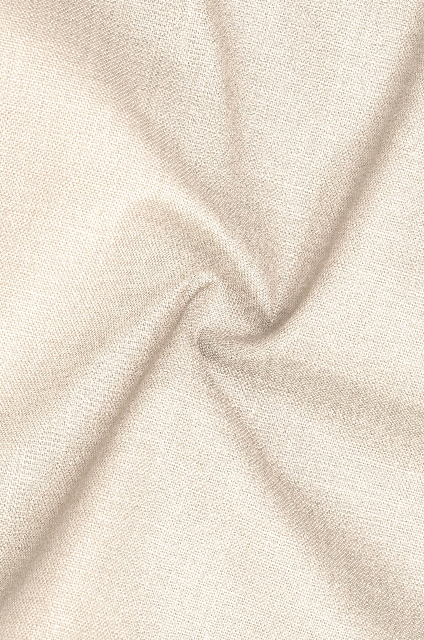 Close-up of beige fabric with folds