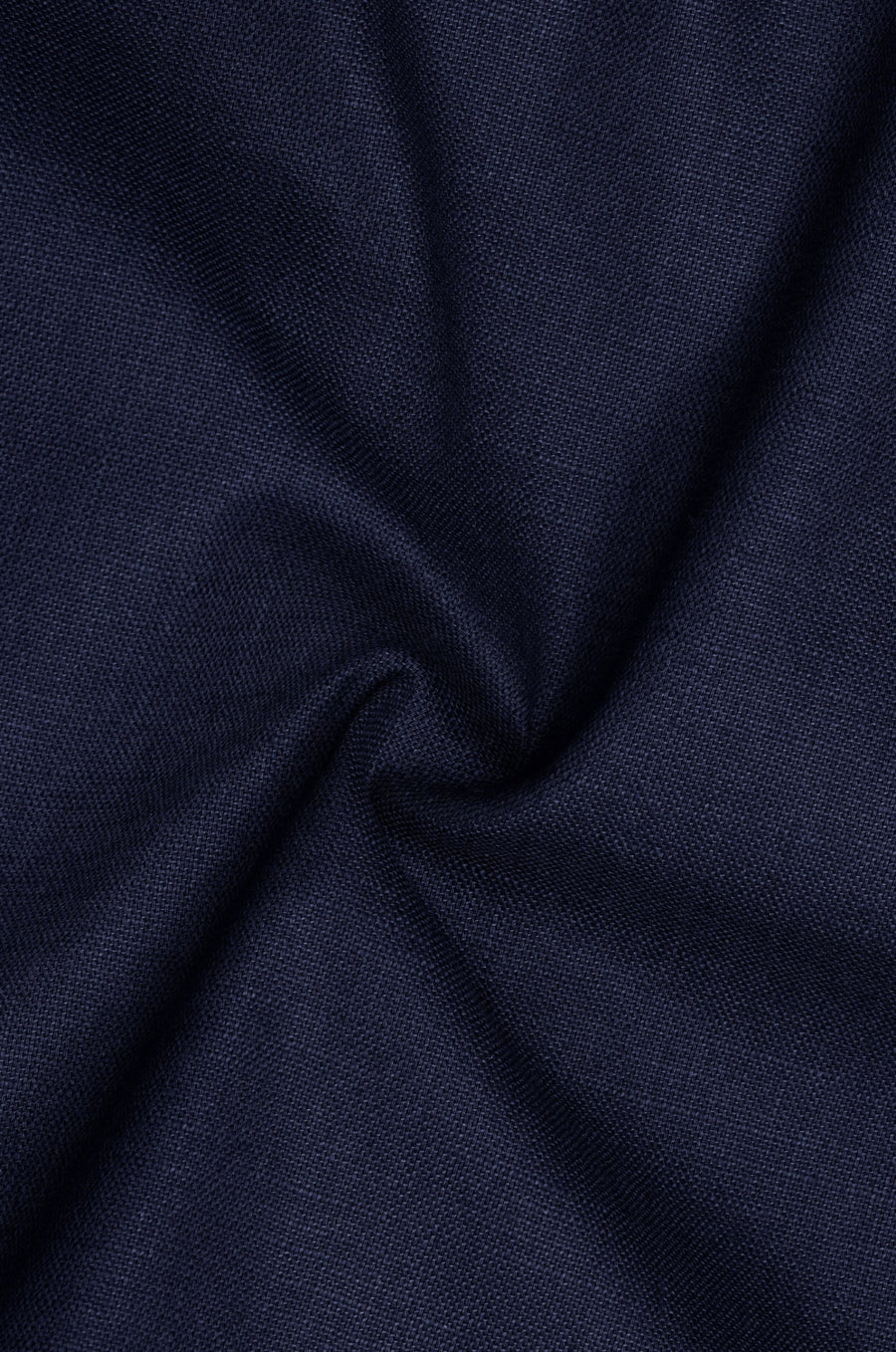 Close-up of dark blue fabric with visible texture