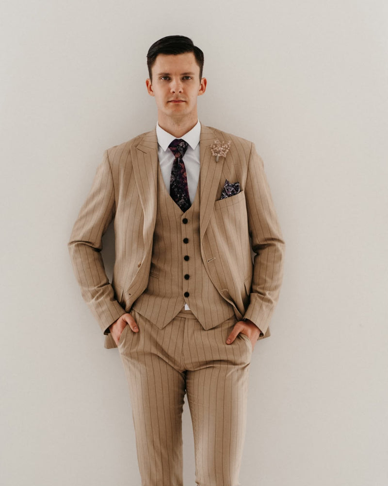 Stone 3-piece suit from Blutailor Milpitas. wearing a BluTailor bespoke suit