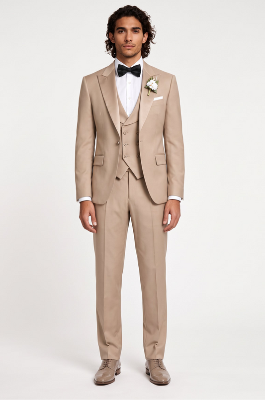 A stylish foreign man confidently wearing a tailored beige suit by Blutailor, showcasing a modern and sophisticated look. The suit features sharp lines and a sleek silhouette, perfectly complementing his unique style.