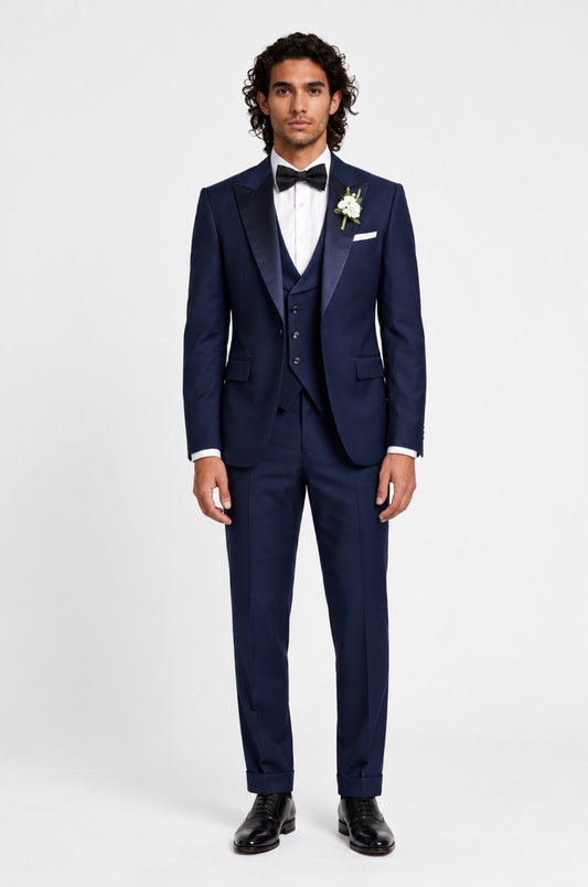 A stylish foreign man confidently wearing a tailored navy suit by Blutailor, showcasing a modern and sophisticated look. The suit features sharp lines and a sleek silhouette, perfectly complementing his unique style.