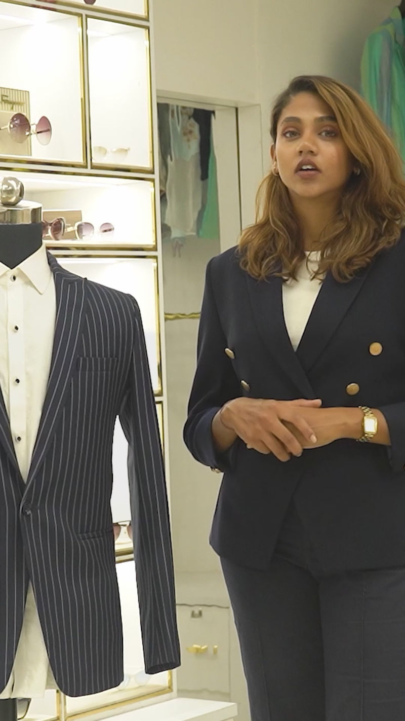 Navy blue pin-stripe suit